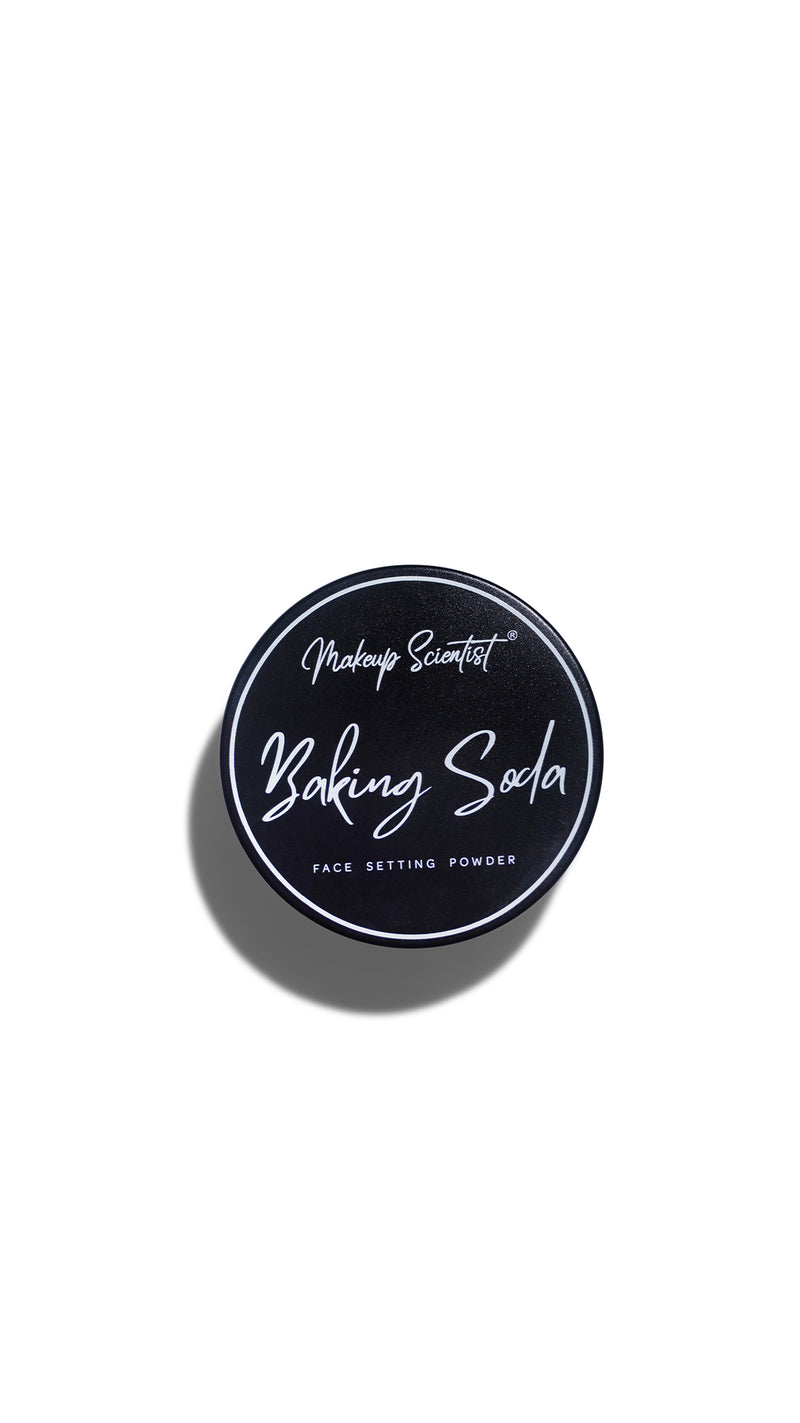 Baking soda face setting powder container on a white background