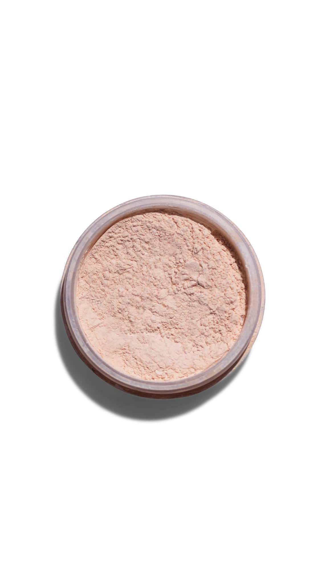 Cosmetic powder in a small round container on a white background